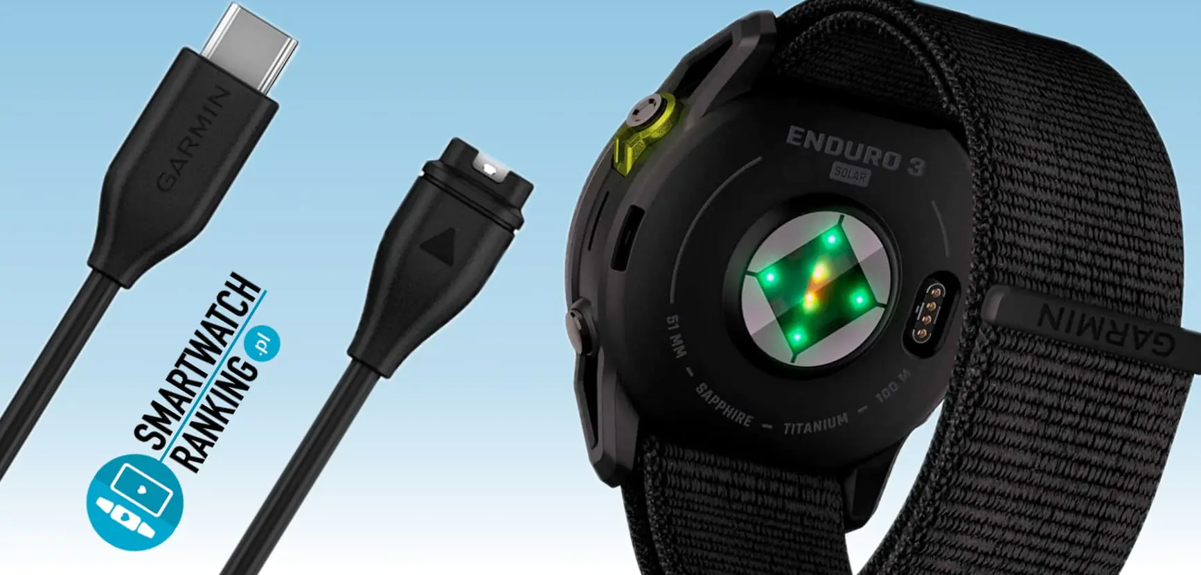 Nowoczesny smartwatch sportowy Garmin Enduro 3 leżący obok dedykowanego kabla do ładowania, pokazujący jak łatwo można naładować pojemną baterię w zegarku